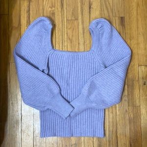 Sweater with shoulder and sleeve details